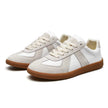 White suede and leather lace-up sneaker with gum sole, pair shown