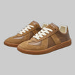 Brown suede and leather lace-up sneaker with gum sole, pair shown