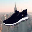 Black suede slip-on sneaker with white platform midsole