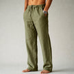 Man wearing green linen drawstring pants with side pocket