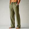 Man wearing green linen drawstring pants with side pocket