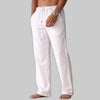 Man wearing white linen drawstring pants with side pocket, hand in pocket