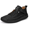 Black leather lace-up sneaker with hook-and-loop strap, three-quarter view