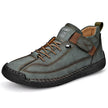 Dark green leather lace-up sneaker with hook-and-loop strap, three-quarter view