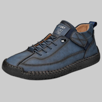 Blue leather lace-up sneaker with hook-and-loop strap, three-quarter view