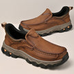 Light brown leather moc-toe slip-on shoe with lugged sole, pair shown