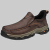 Dark brown leather moc-toe slip-on shoe with lugged sole, three-quarter view