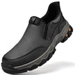 Grey leather slip-on shoe with rugged lugged sole, three-quarter view