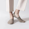 Light grey invisible anti-slip socks on feet - side view showing no-show low-cut design