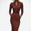 Woman wearing a brown belted midi dress