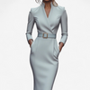 Woman wearing a grey belted midi dress