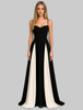 Woman wearing a black and cream color-block maxi dress with a sweetheart neckline