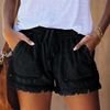 Women's black denim frayed hem shorts with drawstring waist and front patch pockets