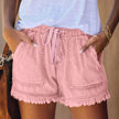 Women's pink denim frayed hem shorts with drawstring waist and front patch pockets