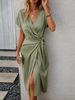 Women's Elegant Wrap Dress Midi in Green — three quarter front view showing draped wrap silhouette