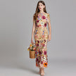 Women's beige mesh mermaid maxi gown with colorful 3D floral appliqués - full body view