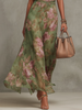 Women's floral halter dress maxi green close-up of floral pattern and waist sash