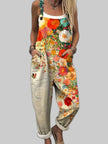Women's floral wide-leg jumpsuit with botanical print in multicolour, spaghetti straps and side pockets