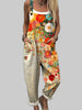 Women's floral wide-leg jumpsuit with botanical print in multicolour, spaghetti straps and side pockets