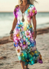 Woman wearing a rainbow watercolor floral print dress