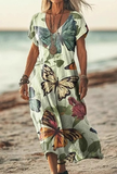 Woman wearing a butterfly print dress