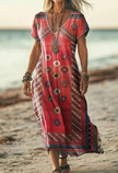 Woman wearing a red boho patterned dress