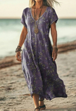 Woman wearing a lavender floral print dress