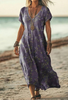Woman wearing a lavender floral print dress