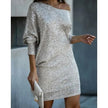 Woman wearing a silver off-shoulder sequin mini dress