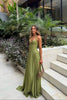 Women's Pleated Evening Dress Maxi in Green - Model at outdoor tropical garden venue