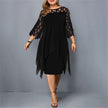 Woman wearing a black flowy midi dress
