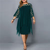 Woman wearing a green flowy midi dress