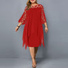 Woman wearing a red flowy midi dress