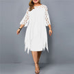 Woman wearing a white flowy midi dress