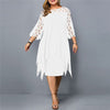 Woman wearing a white flowy midi dress