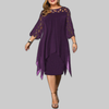 Woman wearing a purple flowy midi dress with cutwork neckline