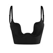 Black seamless push-up bra with deep U-neckline, flat lay