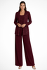 Woman wearing a burgundy sequin jacket, camisole, and wide-leg trouser three piece set