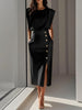 Model wearing black sleeveless midi dress with padded shoulders, gold side buttons, and front slit