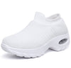 White quilted slip-on sneaker on a model's feet