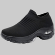 Black knit slip-on sneaker with chunky platform sole