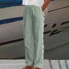 Green striped wide-leg pants with side button placket, side view