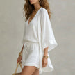 Women's Three Piece Romper Set White – side view showing batwing kimono sleeve and V-neck top