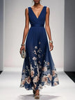 Women's V-Neck Floral Dress Maxi in Navy Blue — full length runway view with ivory and blush floral border hem