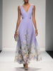 Women's V-Neck Floral Dress Maxi in Purple — full length runway view with pastel floral border in cream and blush tones