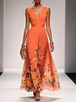 Women's V-Neck Floral Dress Maxi in Orange — full length runway view with bold orange and yellow hibiscus floral border