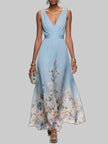 Women's V-Neck Floral Dress Maxi in Light Blue — full length runway view showing deep V-neck bodice and flowing A-line skirt with floral border hem