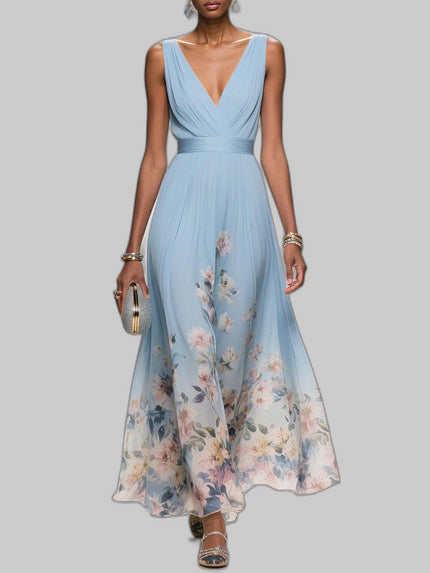 Women's V-Neck Floral Dress Maxi in Light Blue — full length runway view showing deep V-neck bodice and flowing A-line skirt with floral border hem