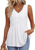 Woman wearing a white textured V-neck peplum top