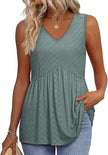 Woman wearing a green textured V-neck peplum top